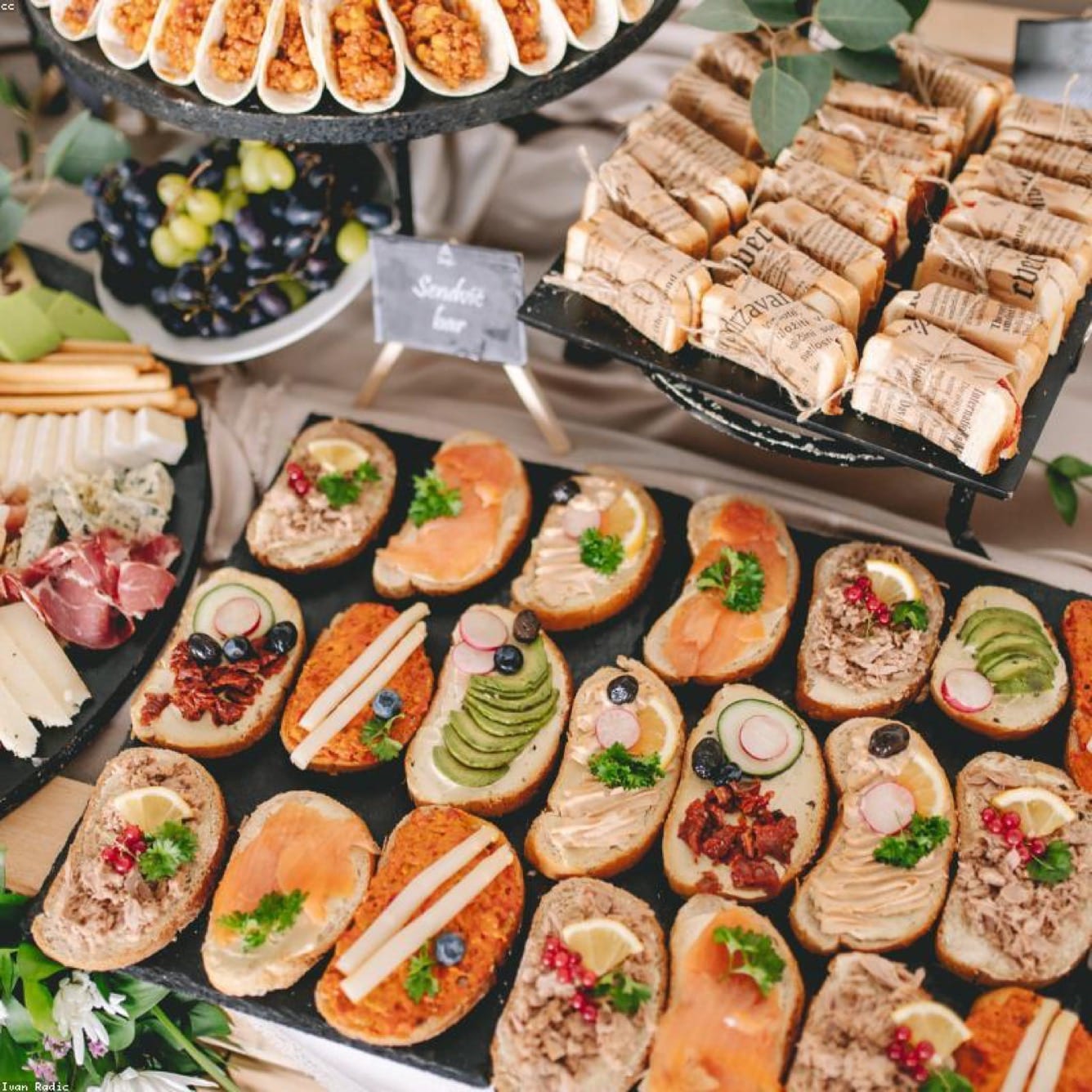 Stacked paper trays at a catering buffet service