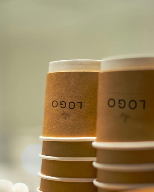 Stacked kraft cups with a printed logo